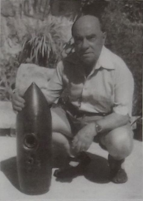 Charles J. Vella with one of the bombs dropped by the fighter-bombers on Mosta on April, 1942.